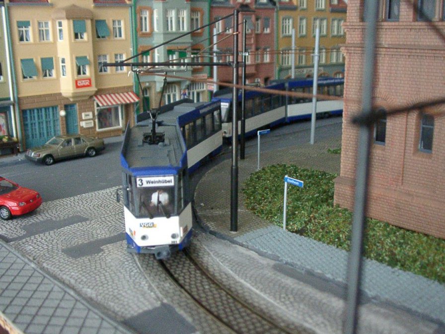 ho trolley train turning in street
